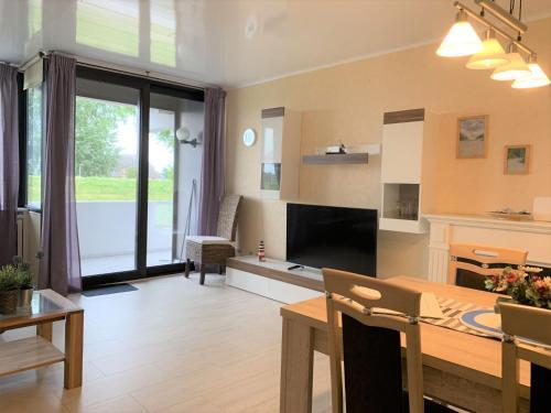 Apartamento Deichblick - Vierjahreszeiten 105
