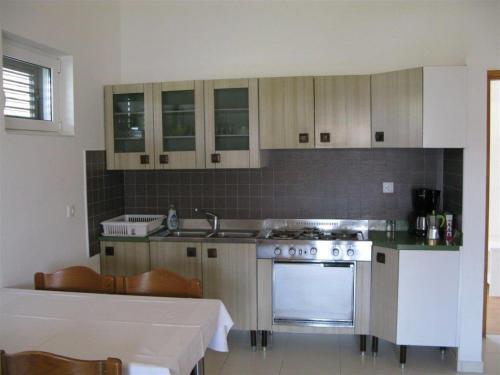 Apartments With A Parking Space Palit, Rab - 16356