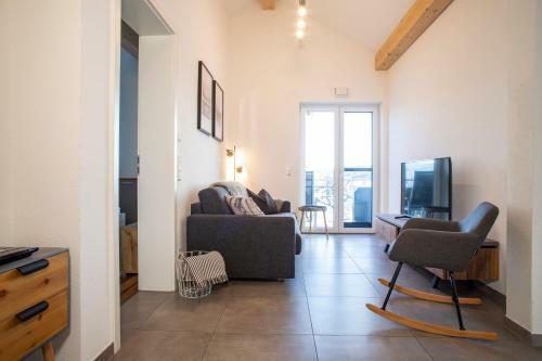 Apartamento Haus Am See - Ferienwohnungen