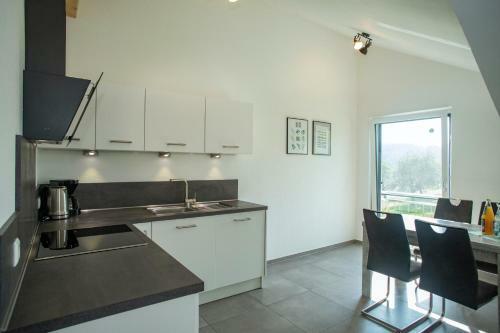 Apartamento Haus Am See - Ferienwohnungen