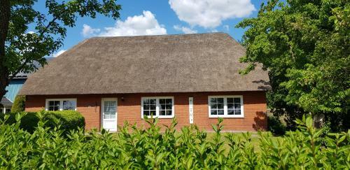 Ferienhaus K�mhuus