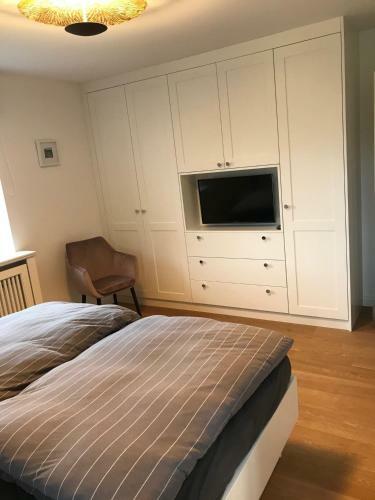 H�s Langl�tjen