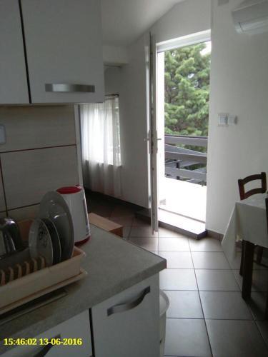 Apartments With A Parking Space Novi Vinodolski - 15292