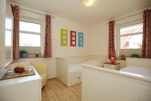 Apartamento Ferienhaus Am Deich Wohnung 04
