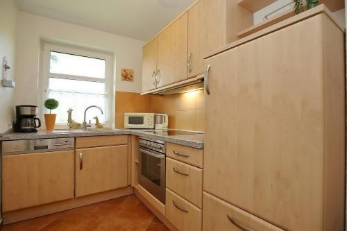 Apartamento Ferienhaus Am Deich Wohnung 04