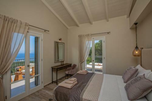 Luxury Villa Above Emblisi Beach , With Heated Pool !