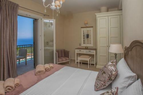 Luxury Villa Above Emblisi Beach , With Heated Pool !