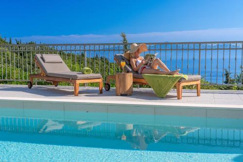 Luxury Villa Above Emblisi Beach , With Heated Pool !