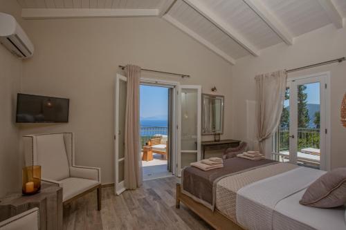 Luxury Villa Above Emblisi Beach , With Heated Pool !
