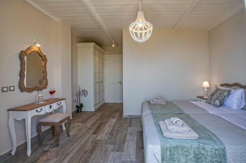 Luxury Villa Above Emblisi Beach , With Heated Pool !