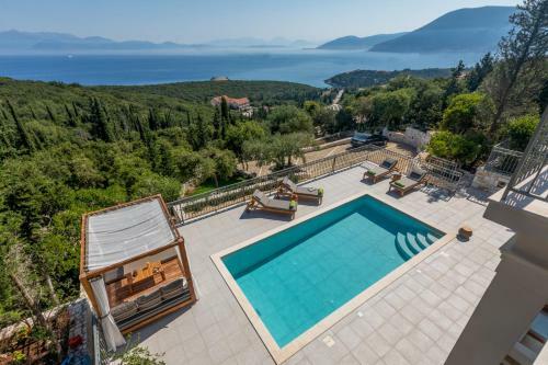 Luxury Villa Above Emblisi Beach , With Heated Pool !