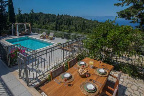 Luxury Villa Above Emblisi Beach , With Heated Pool !