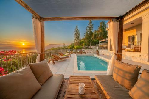 Luxury Villa Above Emblisi Beach , With Heated Pool !