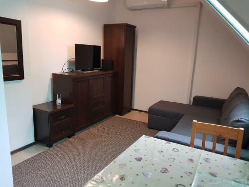 Musk�tli Apartman
