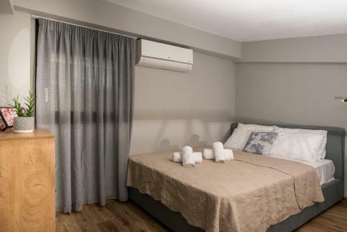 Apartamento Tzes City Suites