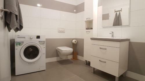 Piacsek Apartmanh�z