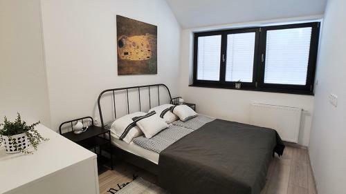 Piacsek Apartmanh�z