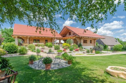 Hotel Heumann_s Blockhaeuser Am Wald
