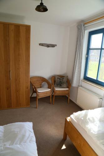 Komfortables Reetdachferienhaus Hasel 1