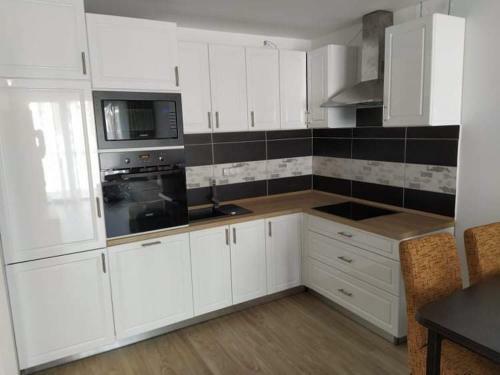 Napsug�r Apartman Ez�stpart