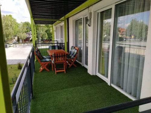 Napsug�r Apartman Ez�stpart