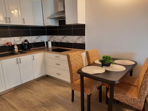 Napsug�r Apartman Ez�stpart