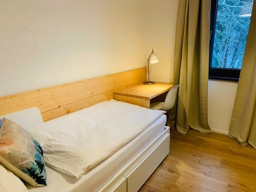 L�?nica Apartments T�le