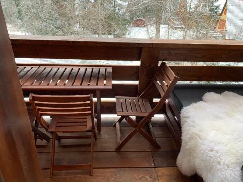 L�?nica Apartments T�le