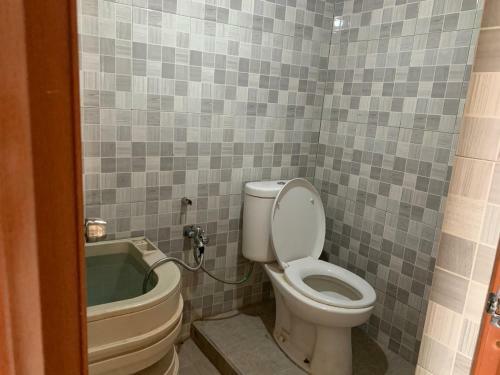 Hotel Oyo 90944 Penginapan Rita Syariah