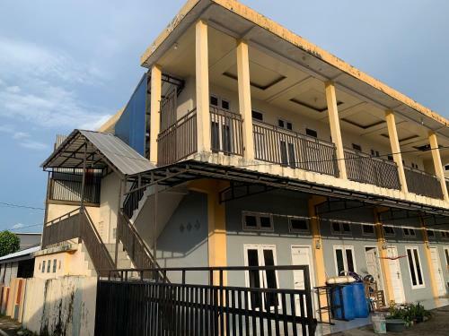 Hotel Oyo 90944 Penginapan Rita Syariah