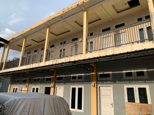 Hotel Oyo 90944 Penginapan Rita Syariah