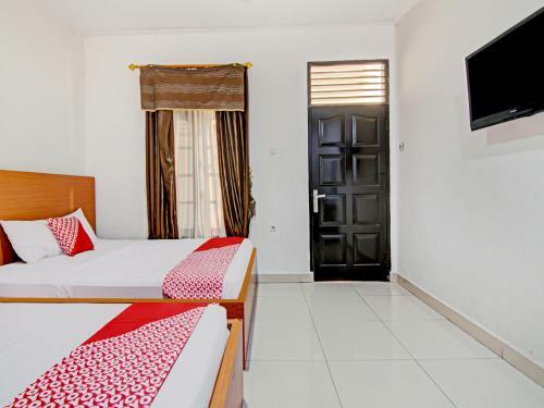 Hotel Oyo 90674 Wisma Syukran Syariah