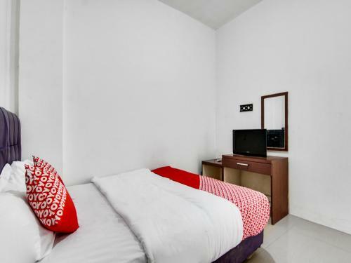 Oyo 90897 Hotel Sepupu Satria