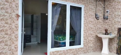 Bed & Breakfast Kost Umah Dewata