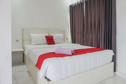 Hotel Reddoorz Syariah @ Raya Punten Batu
