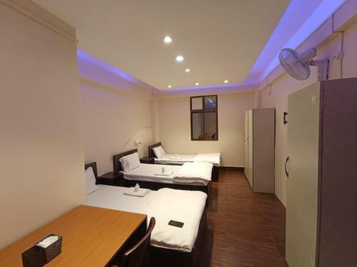 Oyo 87714 Thangal Hotel