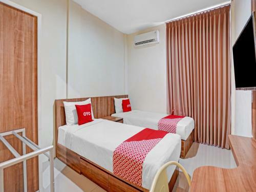Hotel Oyo 90794 Kostel Bunda Waru Syariah