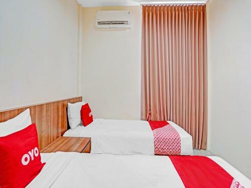 Hotel Oyo 90794 Kostel Bunda Waru Syariah