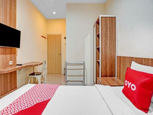 Hotel Oyo 90794 Kostel Bunda Waru Syariah