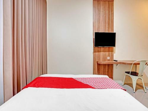 Hotel Oyo 90794 Kostel Bunda Waru Syariah