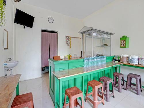 Hotel Oyo 90794 Kostel Bunda Waru Syariah