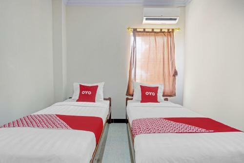 Hotel Oyo 90636 Happy Syariah