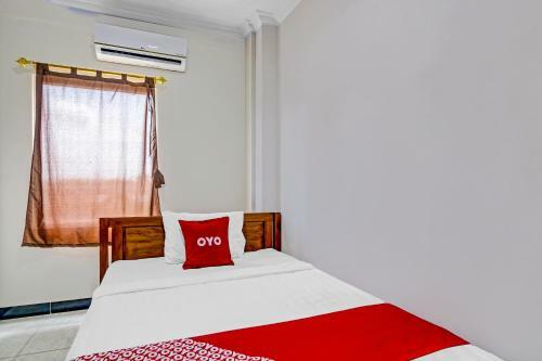 Hotel Oyo 90636 Happy Syariah