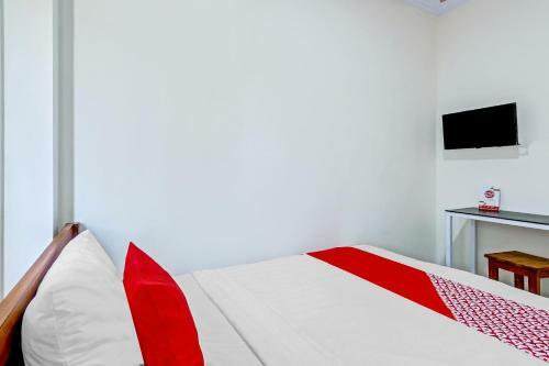Hotel Oyo 90636 Happy Syariah
