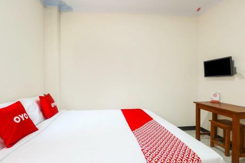 Hotel Oyo 90636 Happy Syariah