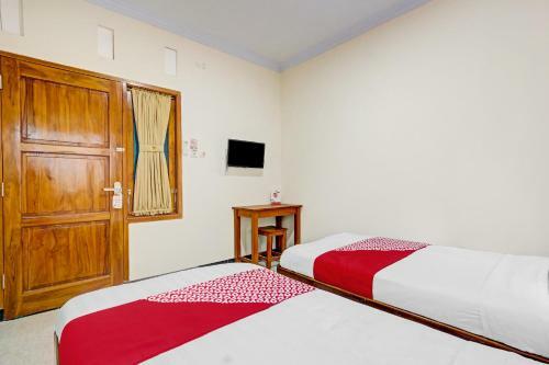 Hotel Oyo 90636 Happy Syariah