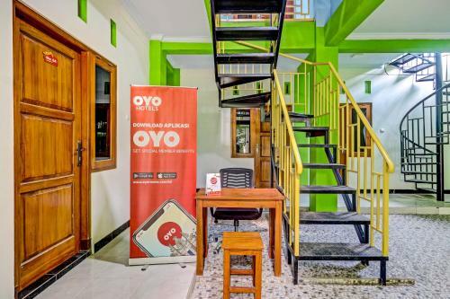 Hotel Oyo 90636 Happy Syariah
