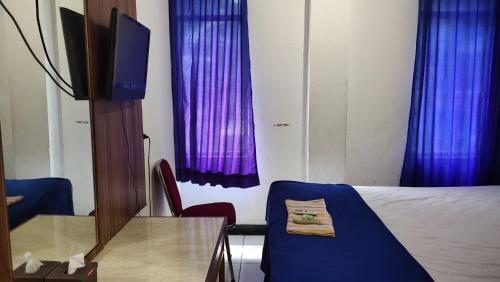 De' Premium Hotel Musi Raya
