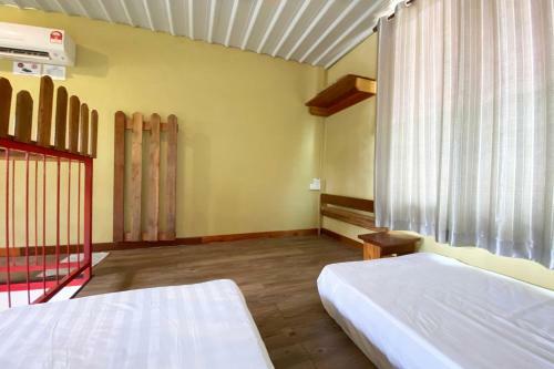 Oyo Home 90312 Rainbow Guesthouse