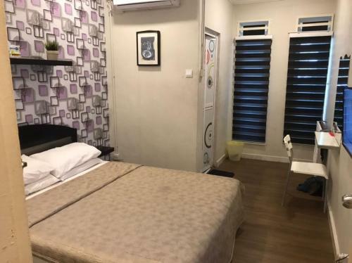 Oyo Home 90358 Homestay Bandar Putra 1